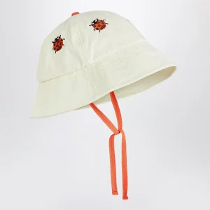 Cappello bianco con coccinelle