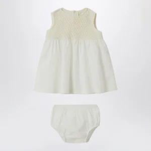 Abito color crema in maglia traforata e voile