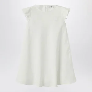 Abito bianco in lino con volant